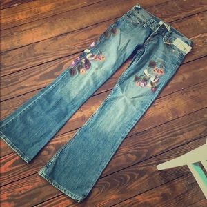 Never worn Allen B. Embroidered jeans.